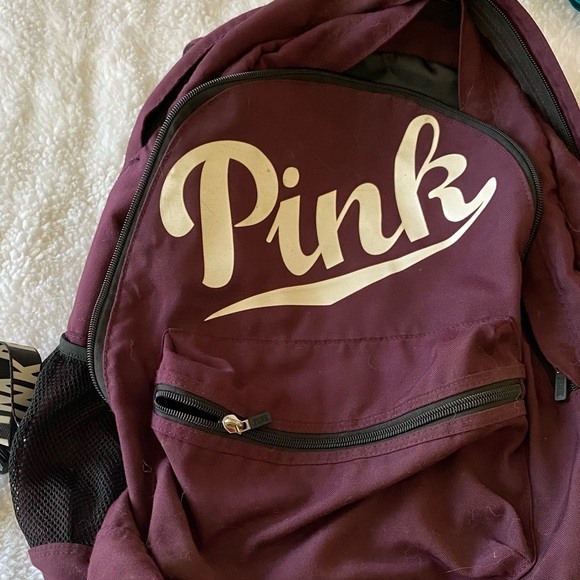 Victoria secret pink backpack maroon color with 4 pockets plus sides for bottles